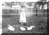 Grandma with chickens.JPG (32760 bytes)
